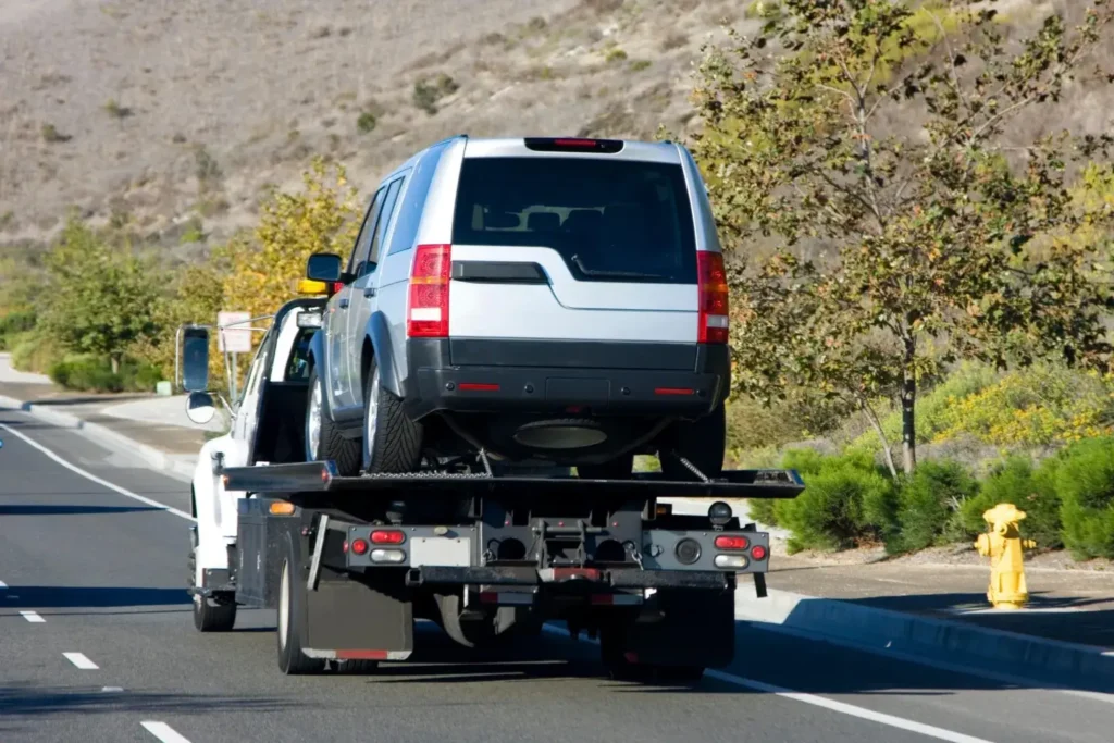 recovery vehicle towing car